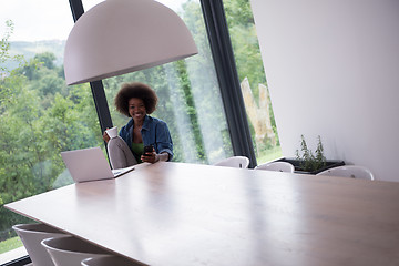 Image showing African American woman in the living room