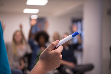 Image showing close up of teacher hand with marker