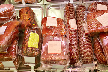 Image showing ham at grocery store stall