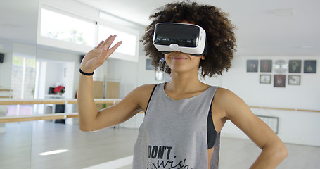 Image showing African american girl using VR glasses