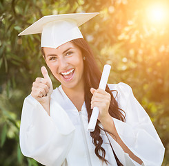 Image showing Graduating Mixed Race Girl In Cap and Gown with Diploma