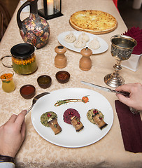 Image showing Man eating in georgian restaurant