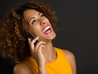 Image showing On the phone with her Best Friend