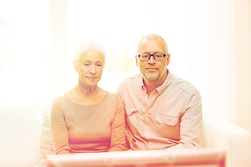 Image showing senior couple watching tv at home