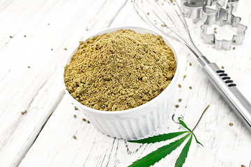 Image showing Flour hemp in bowl on light board