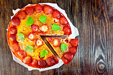 Image showing Pie strawberry with jelly on dark board top