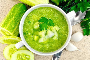 Image showing Soup cucumber in white bowl on stone table top