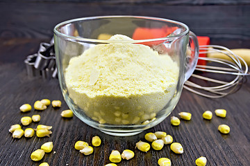 Image showing Flour corn in cup with grains on board