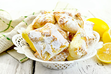 Image showing Cookies lemon in bowl on board