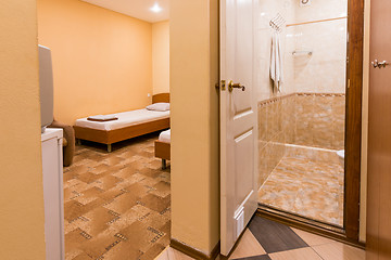 Image showing The interior of the small room, the entrance to the room and bathroom