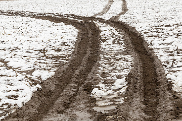 Image showing traces of the car on snow