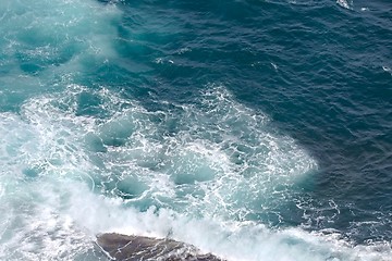 Image showing Waves hitting shore