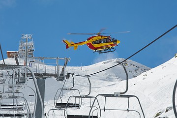 Image showing Rescue helicopter in the mountains