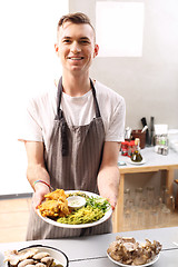 Image showing Vegan dish. The cook prepares a dish dinner. 