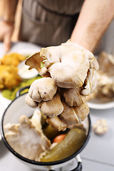 Image showing Oyster mushrooms mushrooms and olive oil.