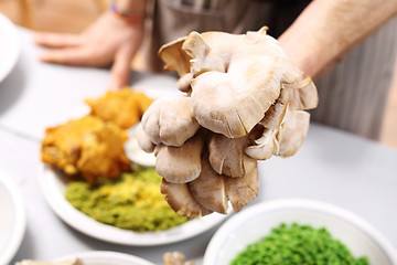 Image showing Oyster mushrooms on the kitchen table.