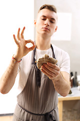 Image showing Cook in a restaurant kitchen 