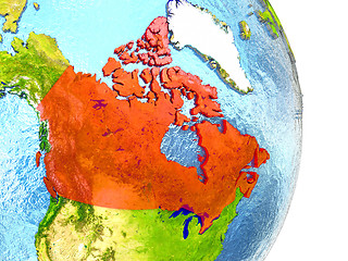 Image showing Canada in red on Earth