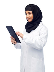 Image showing muslim female doctor in hijab with tablet pc