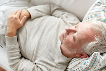 Image showing close up of senior man sleeping on sofa