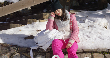 Image showing Young beautiful asian woman relaxing during winter