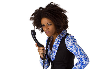 Image showing Angry african american woman with handset