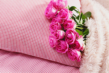 Image showing pink roses on pillow