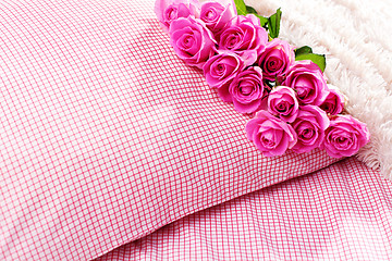 Image showing pink roses on pillow