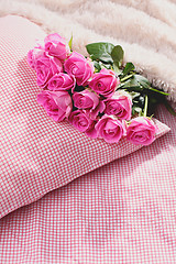 Image showing pink roses on pillow