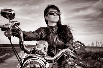 Image showing Biker girl on a motorcycle