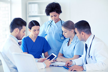 Image showing group of doctors with tablet pc at hospital