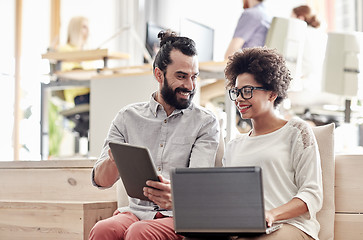 Image showing creative team with laptop and tablet pc in office