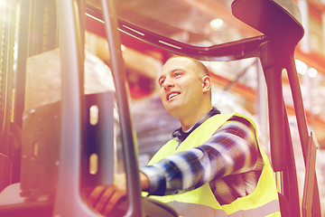 Image showing man operating forklift loader at warehouse