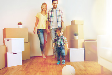 Image showing happy family moving to new home and playing ball