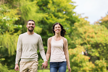 Image showing happy couple walking in summer park