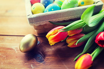 Image showing close up of colored easter eggs and flowers