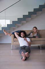 Image showing young couple relaxes in the living room