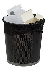 Image showing Full metal trash bin 