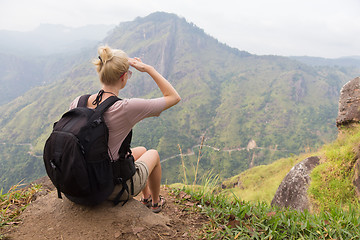 Image showing Female tourist enjoying beautiful view of tea plantations, Sri Lanka.