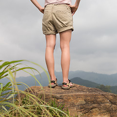 Image showing Female tourist enjoying beautiful view of tea plantations, Sri Lanka.