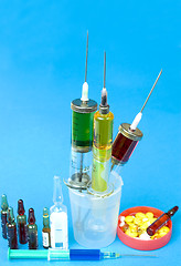 Image showing Syringes and ampoules