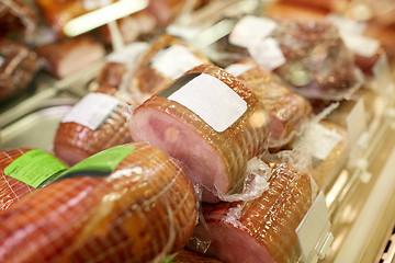 Image showing ham at grocery store stall