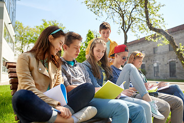 Image showing group of students with notebooks at school yard