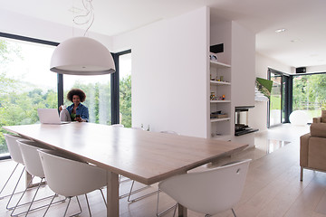 Image showing African American woman in the living room