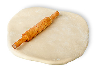 Image showing Small wooden rolling pin to rolled dough