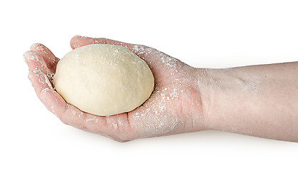 Image showing Piece of dough in human hand