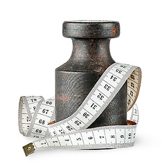 Image showing Old rusty weight wrapped centimeter