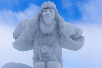 Image showing Snow sculpture of dashing photographer