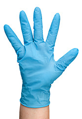 Image showing Hand in blue latex glove