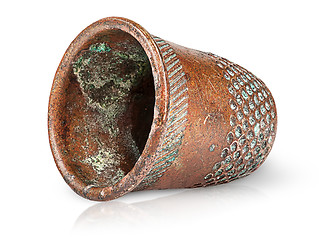 Image showing Old antique copper thimble horizontally